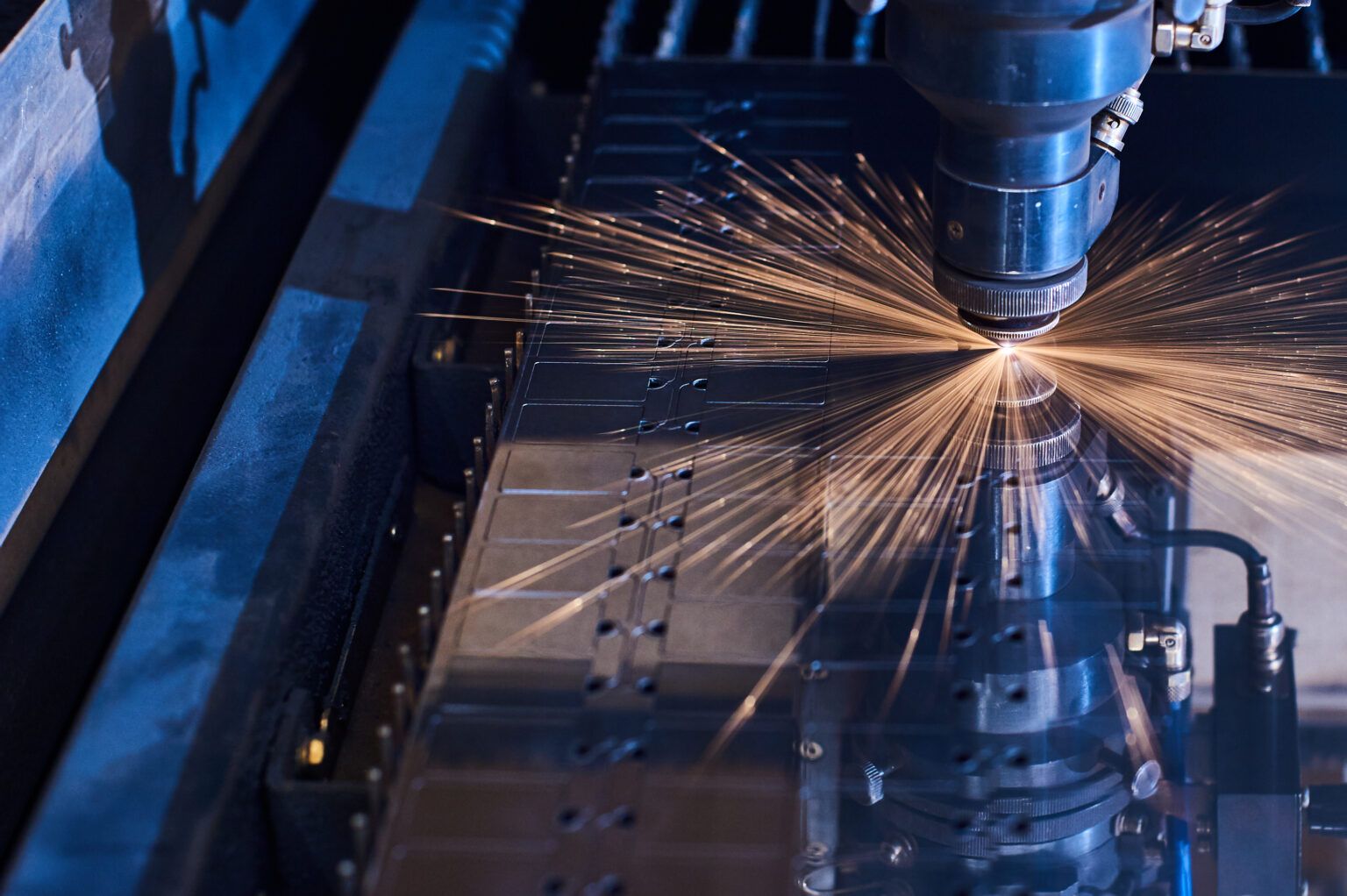 SigmaTau-cnc-laser-cutting-of-metal-close-up-modern-indust-2021-10-21-18-14-15-utc-1536x1022