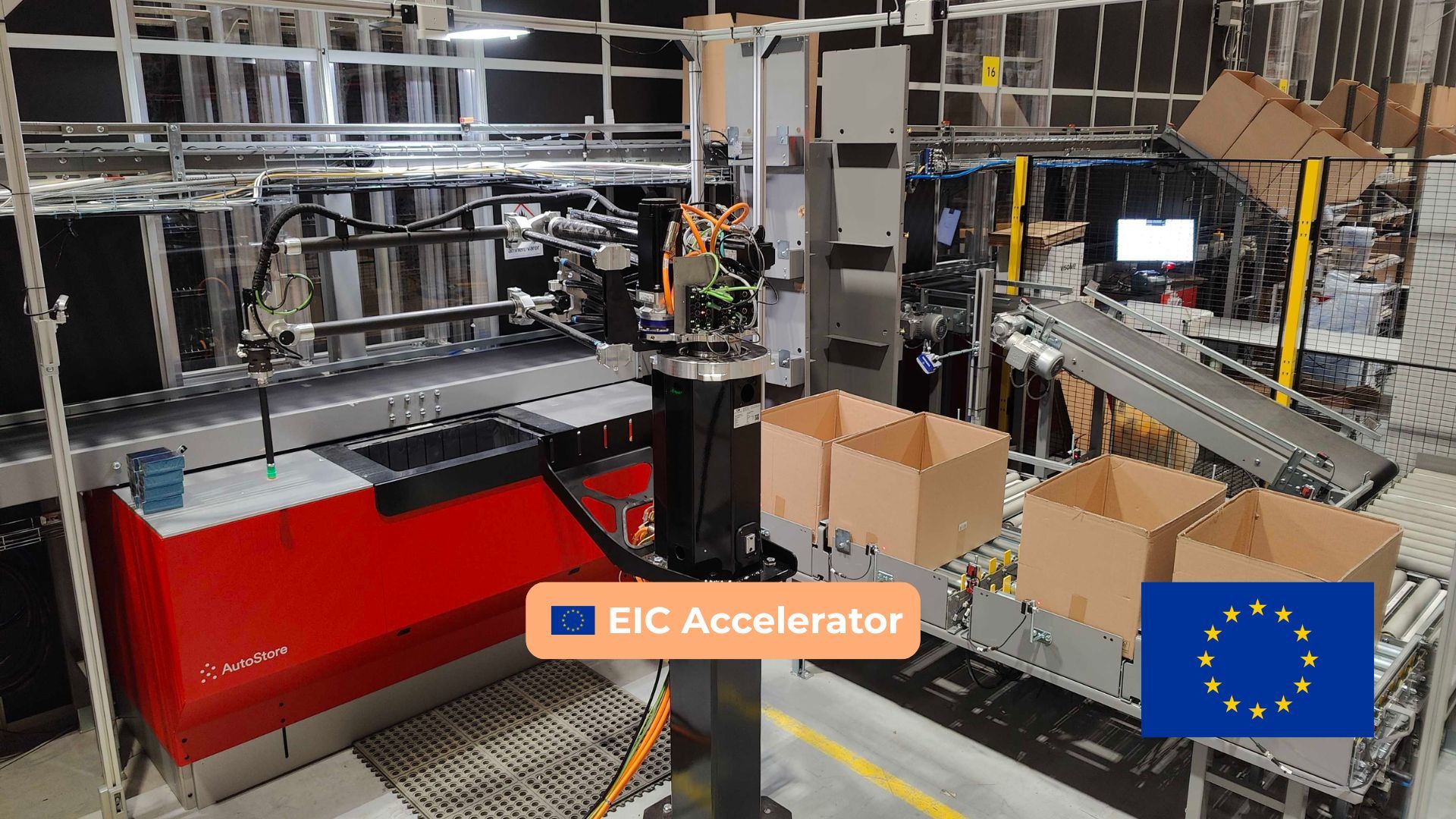 Robotic packaging system with conveyor belts, boxes, and a European Union flag label reading "EIC Accelerator."