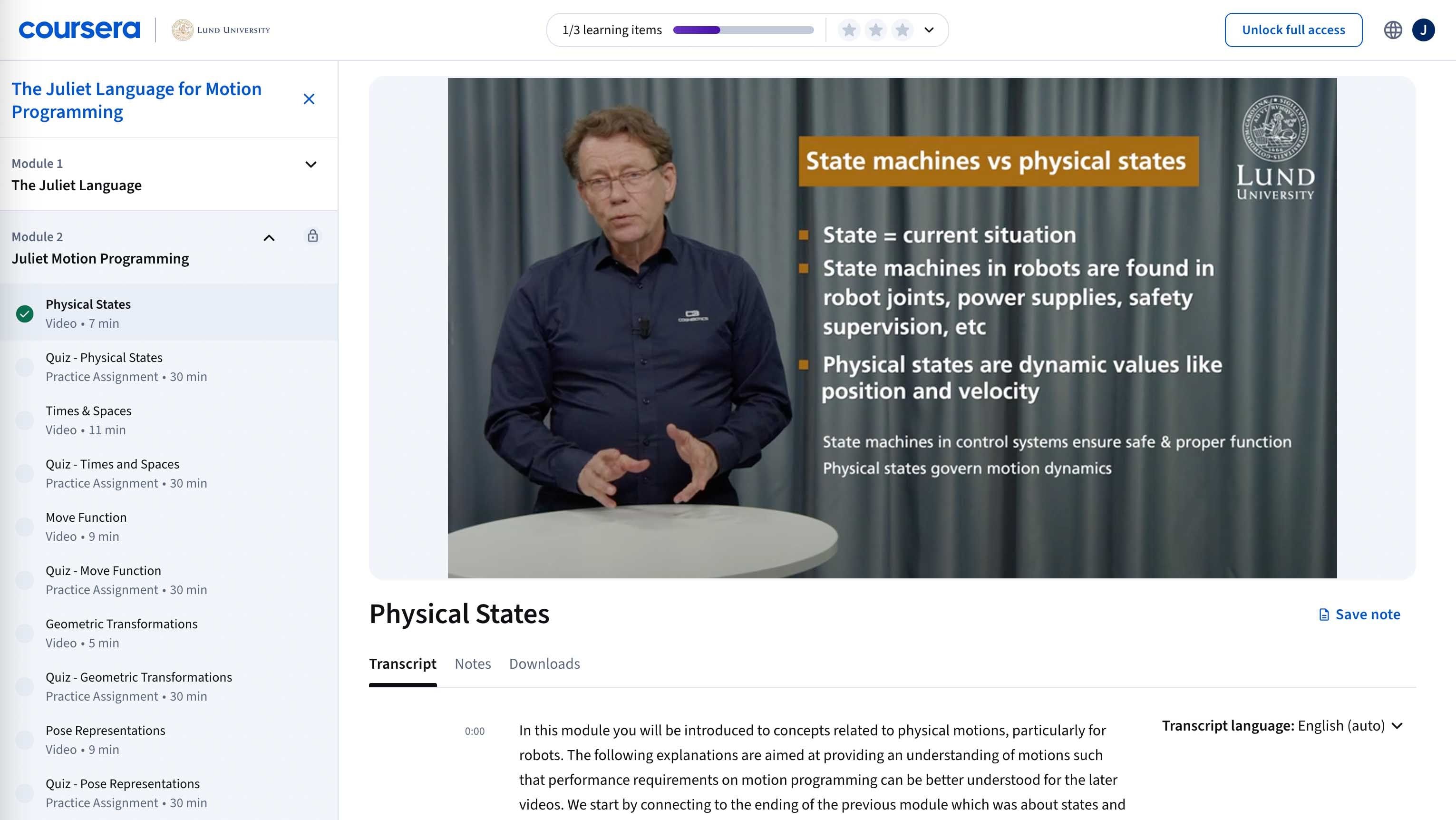 A man is standing at a table giving an online lecture on state machines vs. physical states, with text and transcript on the screen.